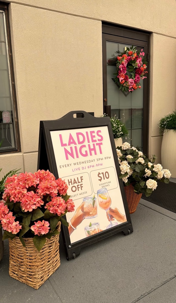 Custom A-frame sidewalk sign outside a business