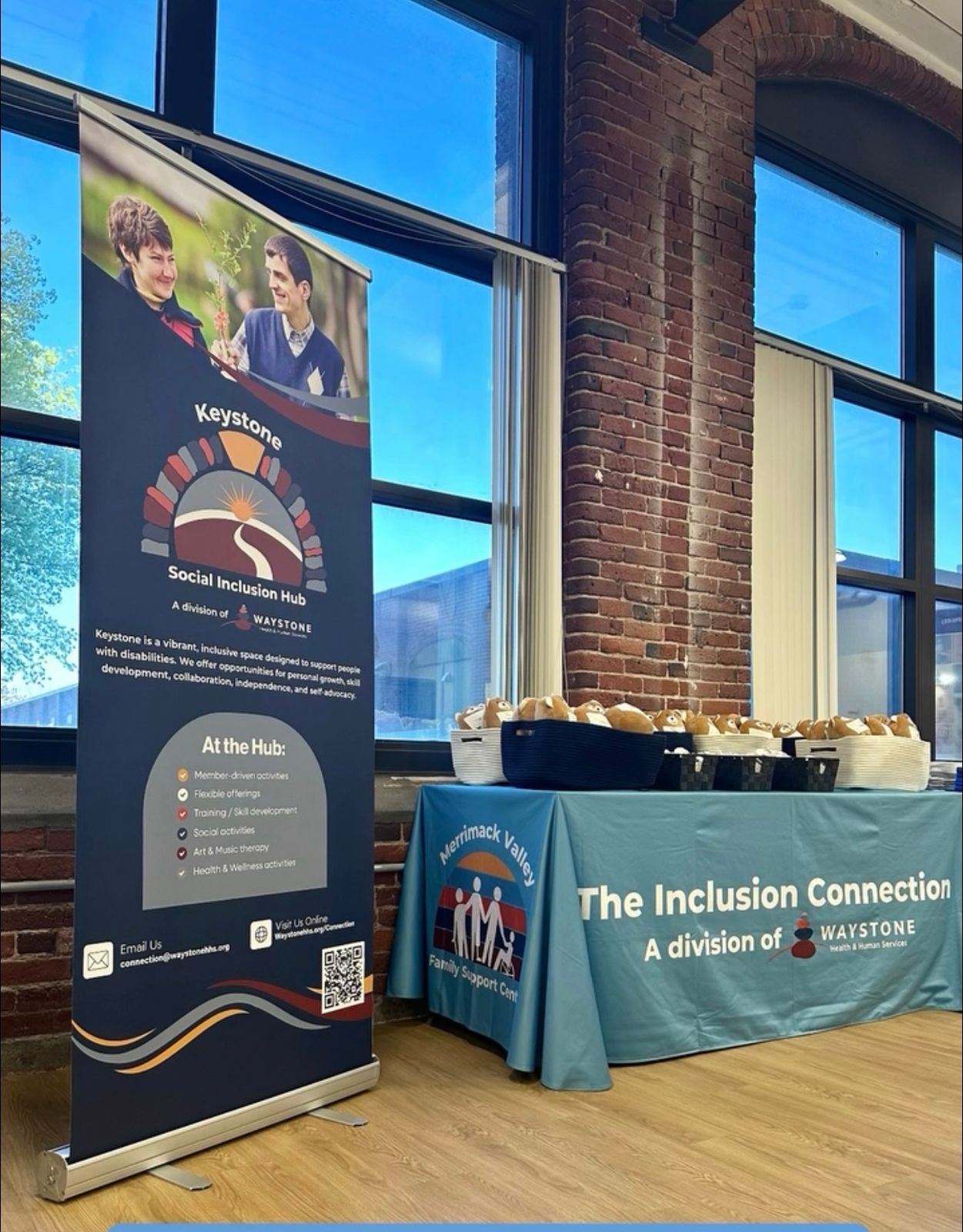 The Inclusion Connection table cover and retractable banner