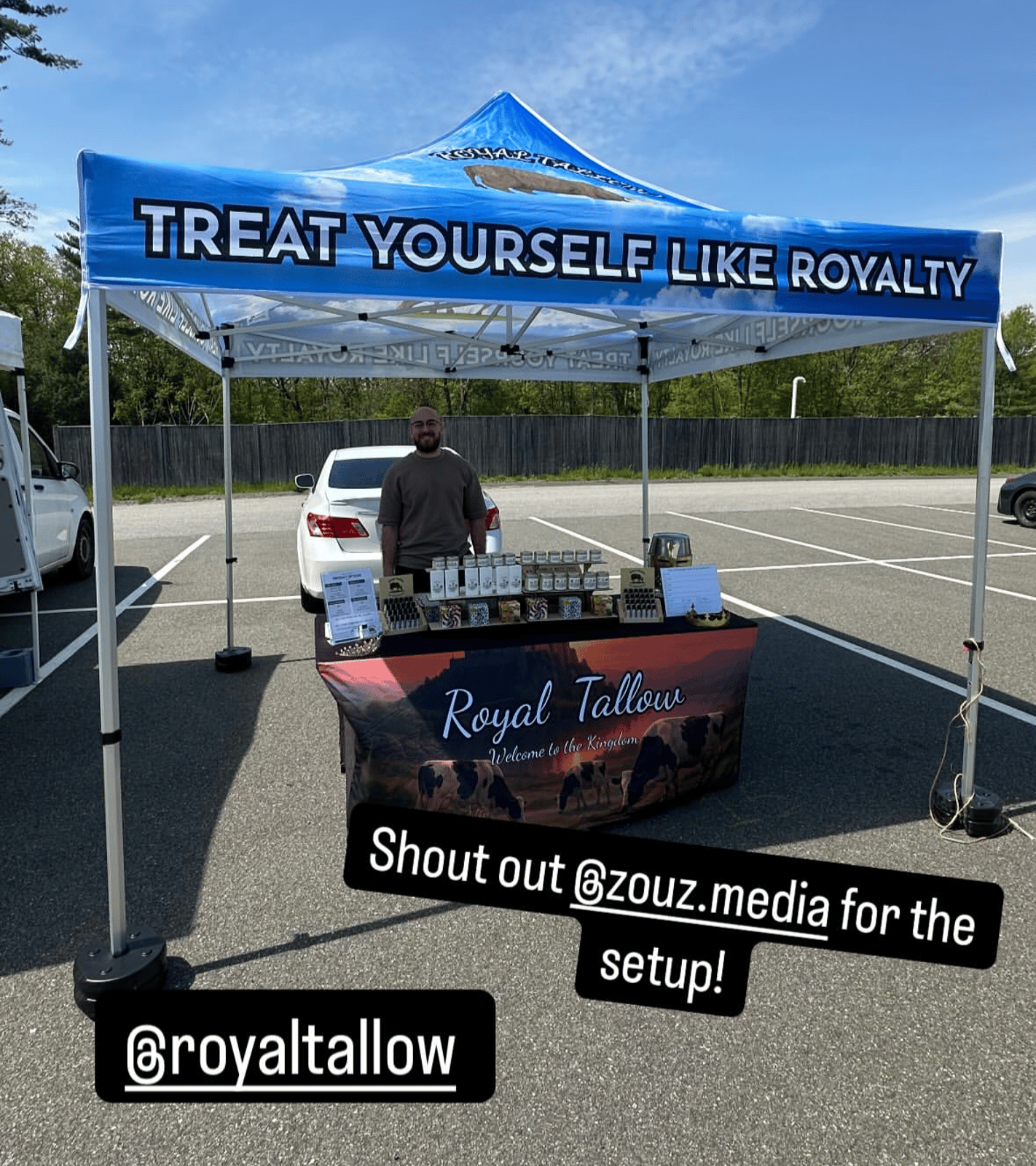 Royal Tallow custom tent and stretch table cover at an outdoor market