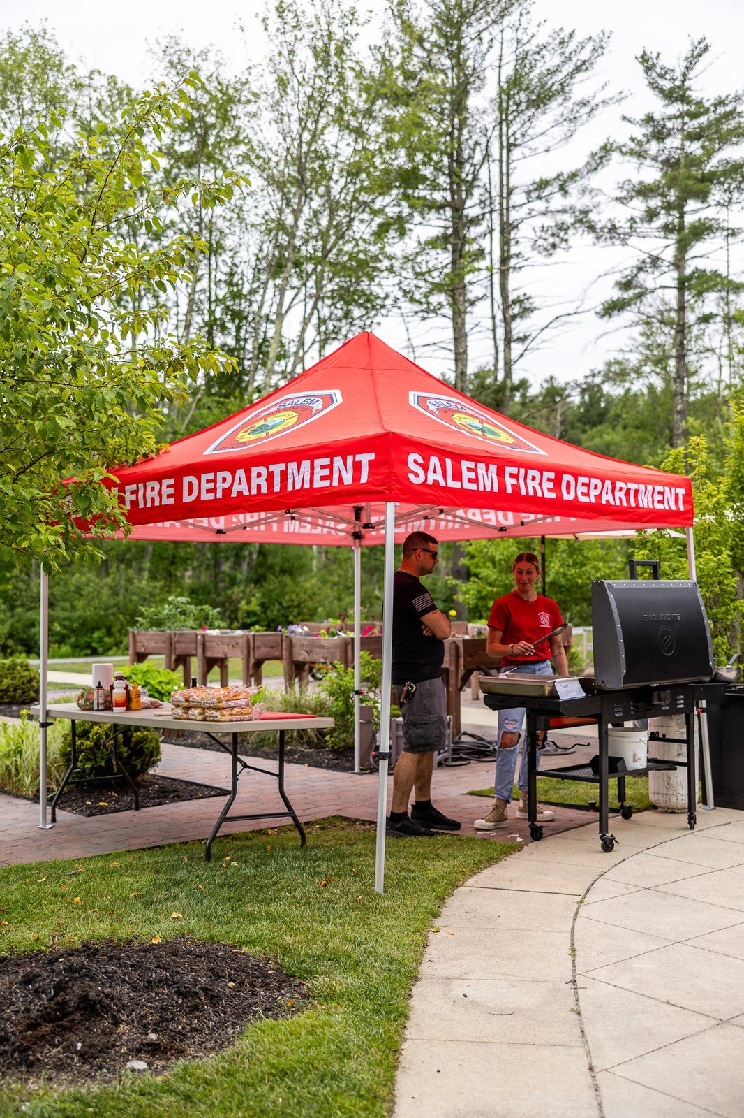 Branded red event tent printed for the Salem Fire Department