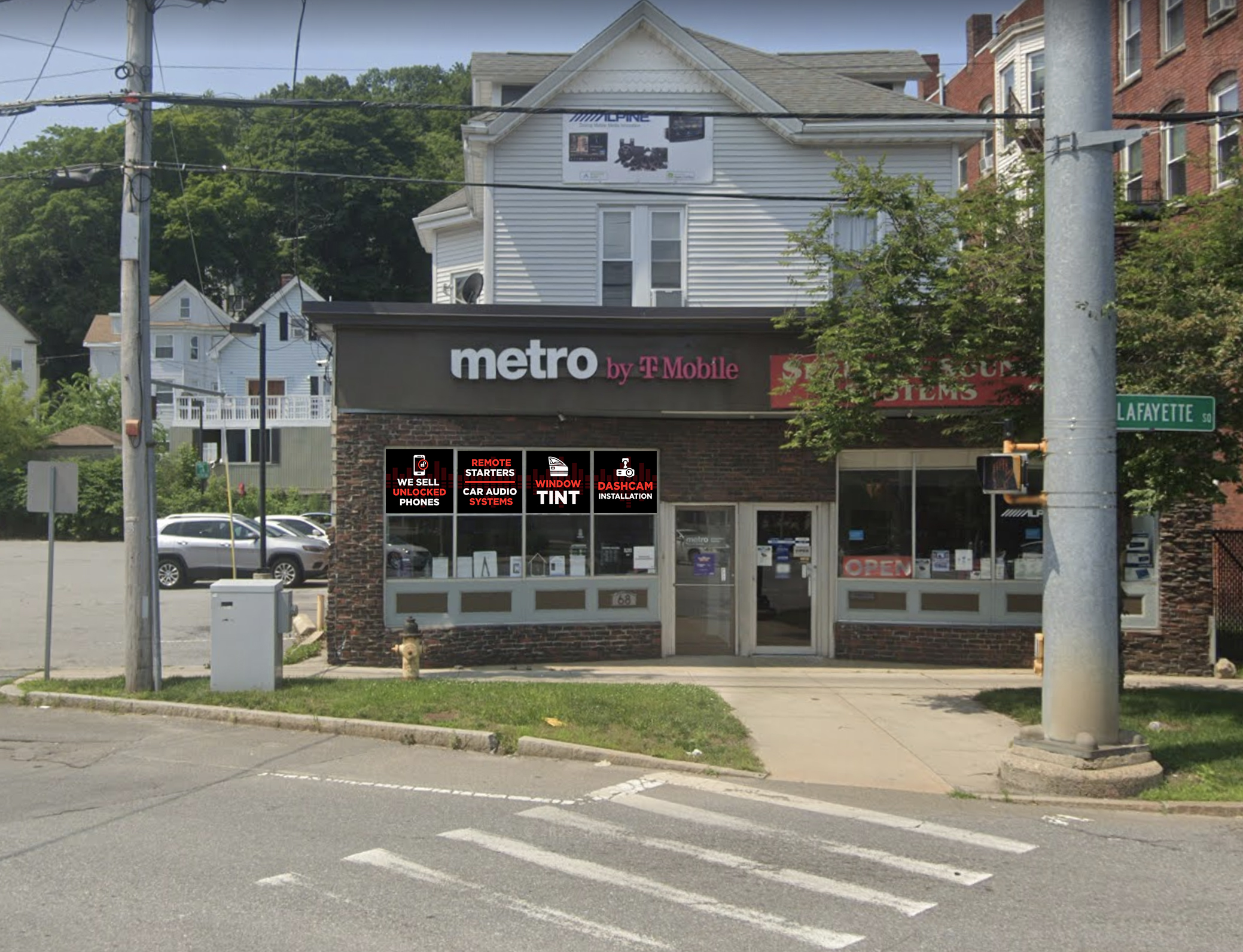 Security Sound Systems storefront in Haverhill with four window graphics